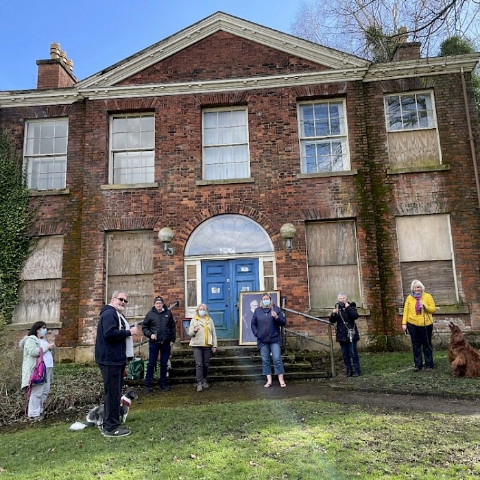 DAERA Minister, Edwin Poots MLA, is  pictured with Jim Brady, Chair of Caledon  Regeneration Partnership, outside the  restored Woolstore.